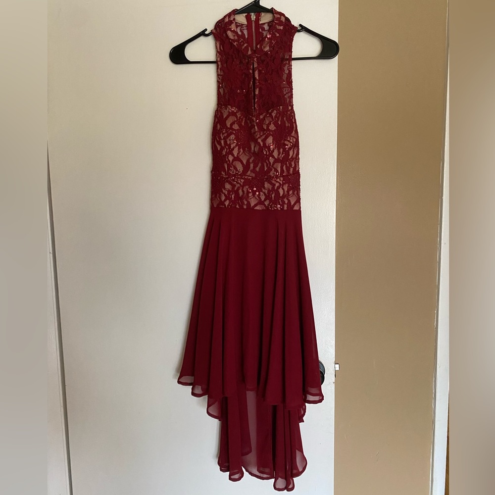 Homecoming dress, slightly longer than mid length, two zippers. Size: 5
